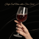 A hand with manicured nails holding a wine glass, symbolizing stylish elegance.